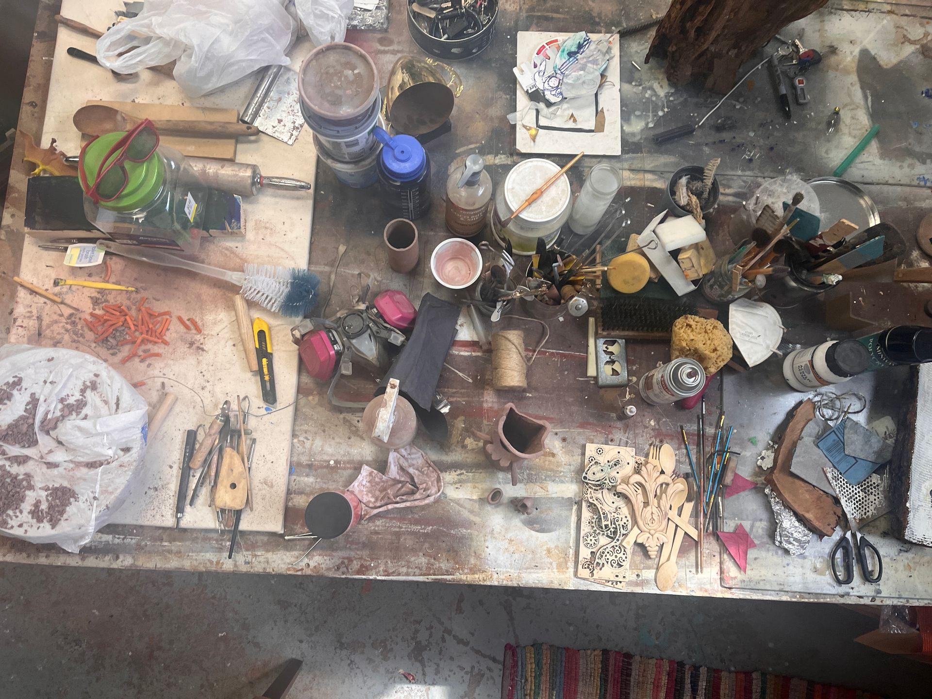 Sundara Heart's art studio table full of wonderful tools and creative things